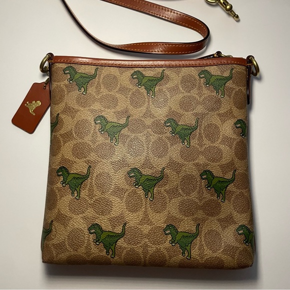 Kitt Messenger Crossbody Bag In Signature Canvas With Rexy Print 🦖 - Picture 2 of 3